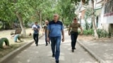 Российский глава аннексированного Крыма Сергей Аксенов инспектирует улицы поселка Гвардейское Симферопольского района, 14 июня 2024 года